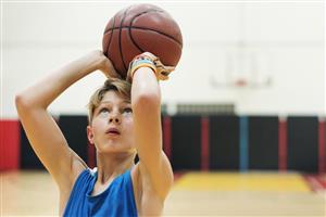 Young Boy Shooting For The Hoop Young Boy Shooting For The Hoop